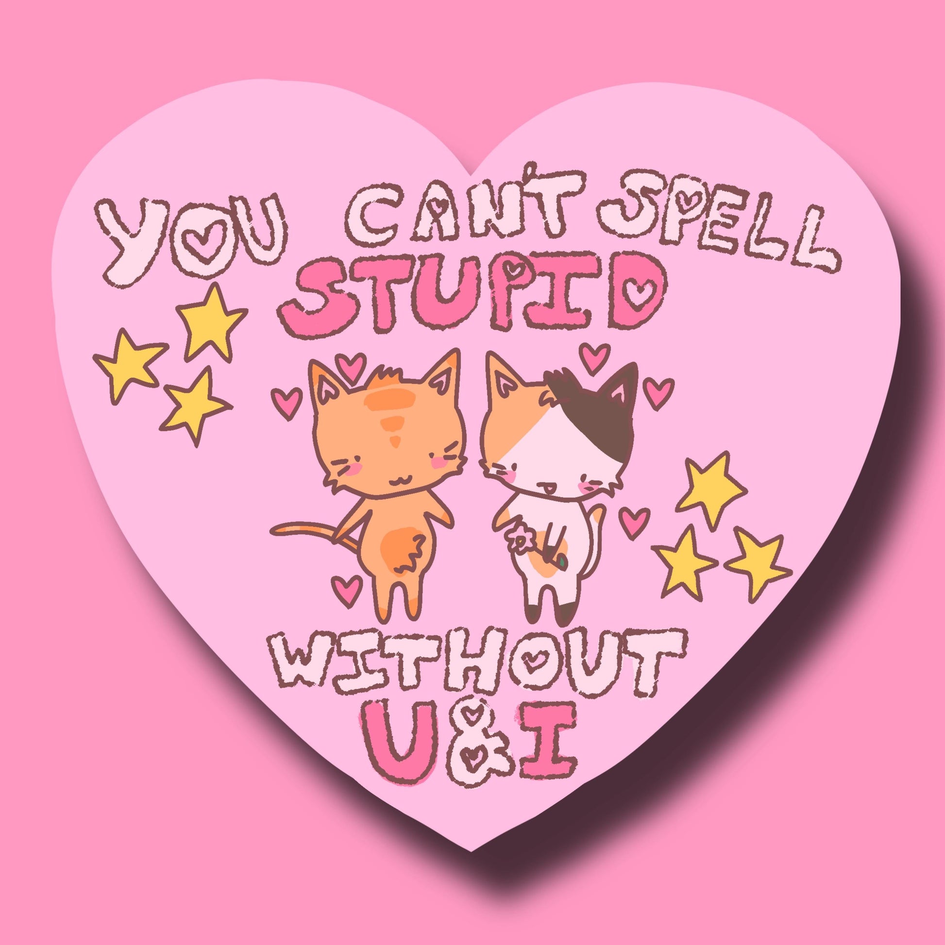 A pink heart-shaped sticker or decal with cute cartoon cats and the text 'YOU CAN'T SPELL STUPID WITHOUT U&I' on a solid pink background.